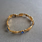 Vergoldetes Vintage-Armband mit blauen Steinen – Elegant und filigran