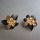 Vintage Clip-Ohrringe mit floralen Motiven – Schwarz-Goldener Retro-Charme