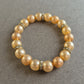 Elastisches Perlenarmband mit Strass – Champagnerfarbene Eleganz