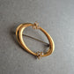 Elegante ovale Vintage-Brosche – Goldoptik mit Strassakzenten