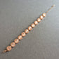 Roségoldfarbenes Strassarmband – Mit schimmernden Cabochon-Steinen