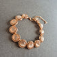 Roségoldfarbenes Strassarmband – Mit schimmernden Cabochon-Steinen