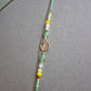 Boho-Kette mit Halbmond & grünen Perlen