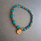 Boho-Stretcharmband in Türkis mit Goldakzenten – Sommerliches Highlight