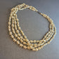 Mehrreihige Vintage-Perlenkette – Eleganz in Creme mit Goldakzenten