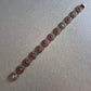 Vintage-Armband mit roten Steinen und Zierspiralen
