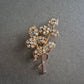 Strass-Brosche in Blumenform – Funkelnder Vintage-Chic in Goldoptik
