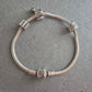 Charm-Armband von Pandora aus 925er Silber – Mit 4 Silber-Beads