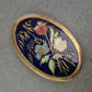 Orientalische Emaille-Brosche mit Blumenmotiv – Goldfarbener Rahmen