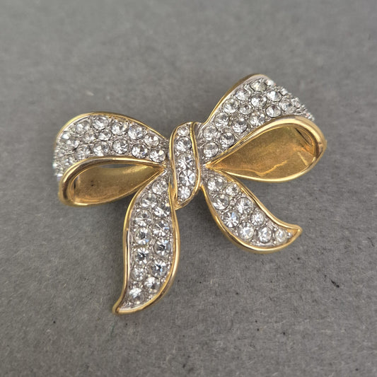 Elegante Schleifenbrosche – Strassbesetzt in Goldoptik