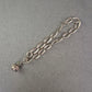 925er Silberarmband mit Glockenanhänger – Handgemachter Charme