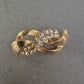 Elegante Vintage-Brosche in Goldoptik mit Strasssteinen