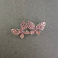 Glitzernde Schmetterlingsbrosche mit rosa Strasssteinen