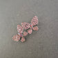 Glitzernde Schmetterlingsbrosche mit rosa Strasssteinen