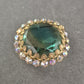Vintage-Brosche mit grünem Glasstein & Strass – Funkelnder Retro-Charme