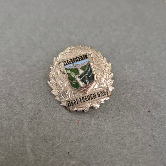 Anstecknadel „Krimml – Dem treuen Gast“ – Souvenir aus Österreich