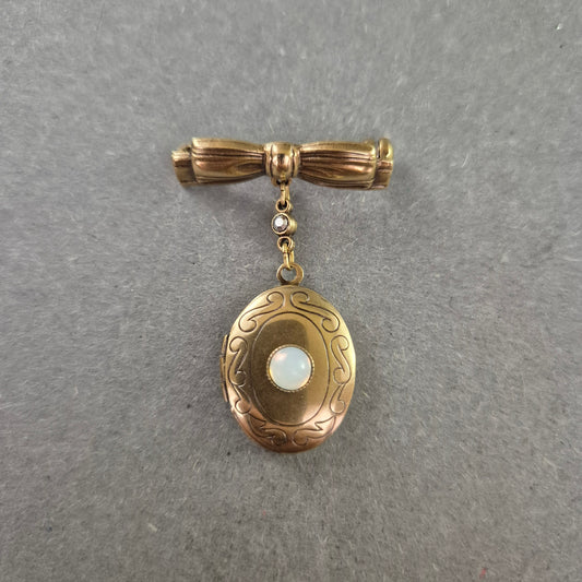 Antike Schleifen-Brosche mit Medaillon – Opaloptik & Fotofach