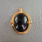 Großer Vintage-Anhänger mit schwarzem Cabochon und Goldrahmen