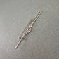 Elegante Vintage-Brosche aus Silber mit funkelndem Steinbesatz