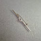 Elegante Vintage-Brosche aus Silber mit funkelndem Steinbesatz