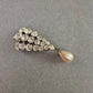 Vintage Strassbrosche mit Tropfenperle – Glamour im Retro-Stil