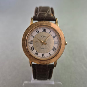 CMI Quarz Uhr im Vintage-Stil – Goldgehäuse mit römischen Zahlen