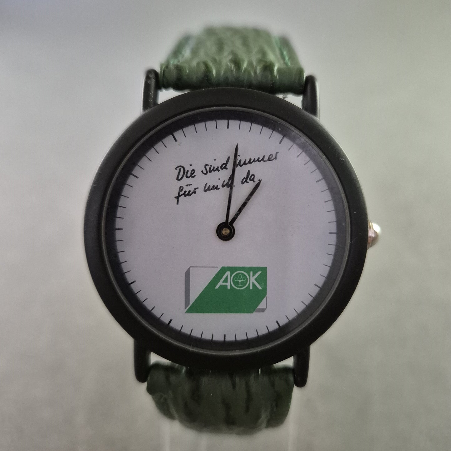 Seltene AOK Quarz Uhr – Werbeuhr mit grünem Lederarmband