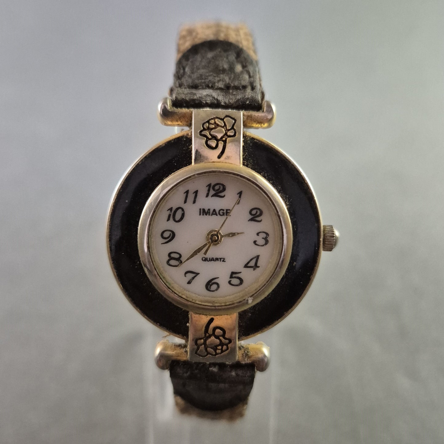 Verspielte Damenarmband Uhr von IMAGE – Blütenmotiv trifft Vintage-Charme