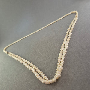 Zweireihige Perlenkette – Natürlicher Glanz mit Vintage-Charme