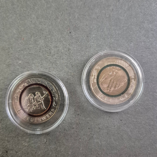 2x 10-Euro-Gedenkmünzen mit Polymer-Ring – Feuerwehr & Pflege