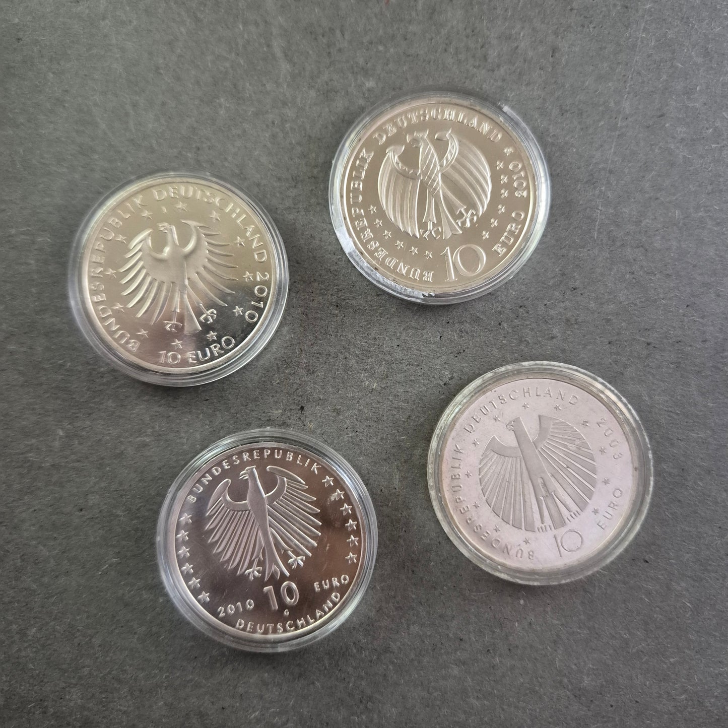 4x 10-Euro-Gedenkmünzen Deutschland – Schumann, Zuse, Raumfahrt & WM 2006