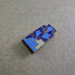 Vintage Anstecknadel mit Emaille-Motiv in Blau – Geometrisches Design
