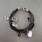 Multireihiges Armband mit Anhängern – Peace, Herzen & Glanzdetails
