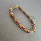 Vintage Gliederarmband mit roten Steinen – Schmuckstück mit Charakter