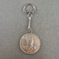 Schlüsselanhänger mit asiatischer Münzprägung im Retro-Stil