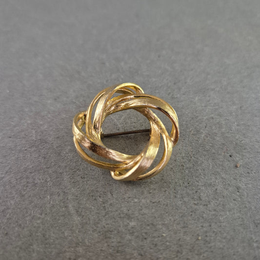 Runde Vintage-Brosche im Knotendesign – Zeitlose Eleganz