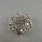 Glamouröse Vintage-Brosche mit klaren Strasssteinen – Rundes Design