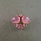 Elegante Vintage-Brosche mit rosa Glascabochons – florale Form