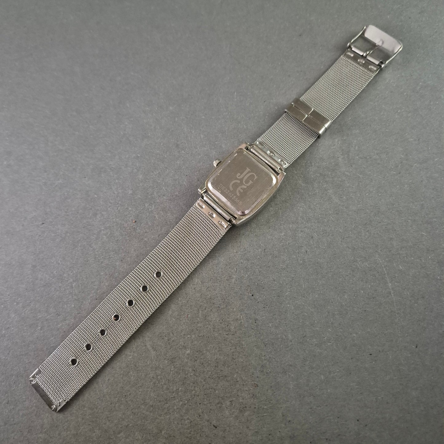 JG Damenarmbanduhr – Silbernes Meshband mit Strassrahmen