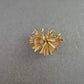 Auffällige Vintage Brosche in Sternblumen-Optik – Goldfarbenes Statement