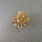 Auffällige Vintage Brosche in Sternblumen-Optik – Goldfarbenes Statement