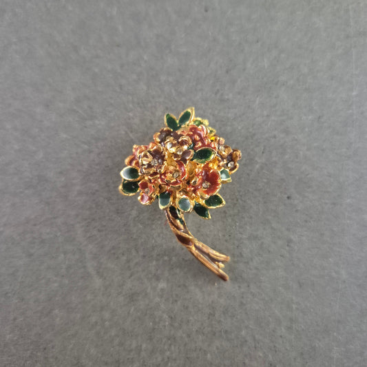 Vintage Blumenbrosche aus Emaille – Farbenfroher floraler Charme