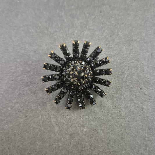 Schwarze Vintage-Brosche im Sonnenstrahl-Design – Funkelnder Strass