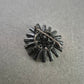 Schwarze Vintage-Brosche im Sonnenstrahl-Design – Funkelnder Strass
