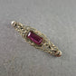 Filigrane Jugendstil-Brosche mit violettem Glasstein im Antik-Look