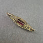 Filigrane Jugendstil-Brosche mit violettem Glasstein im Antik-Look