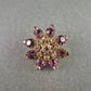 Vintage-Brosche mit lila Strasssteinen – Funkelnder Retro-Schmuck