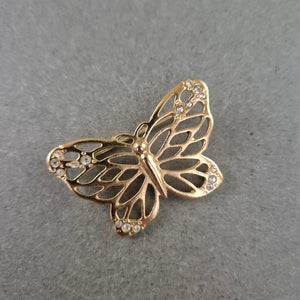 Vintage Schmetterlingsbrosche mit Strass – Goldfarbener Glanz