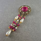 Opulente Vintage-Brosche mit Perlen und rubinrotem Glascabochon