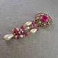 Opulente Vintage-Brosche mit Perlen und rubinrotem Glascabochon